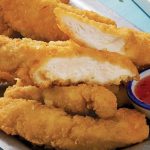 Our golden chicken tender strips are a hit at all the kids parties
