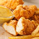Our golden crispy tender chicken strips are always a hit at kid parties