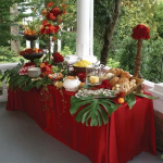 Outdoor tropical buffet catering setup in Miami with fresh dishes by Rivera Events