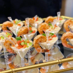 Elegant shrimp cocktail appetizers served in mini glasses by Rivera Events in Miami