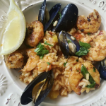 Seafood paella catering dish prepared by Rivera Events in Miami