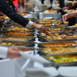 Buffet catering service in Miami with assorted hot dishes by Rivera Events
