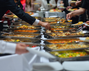 Buffet catering service in Miami with assorted hot dishes by Rivera Events